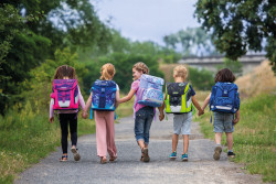 Schoolbag, 5 children holding...