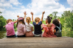 Schoolbag, 6 children arms up...