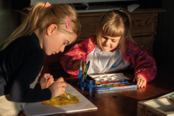 2 girls with painting apron, K...